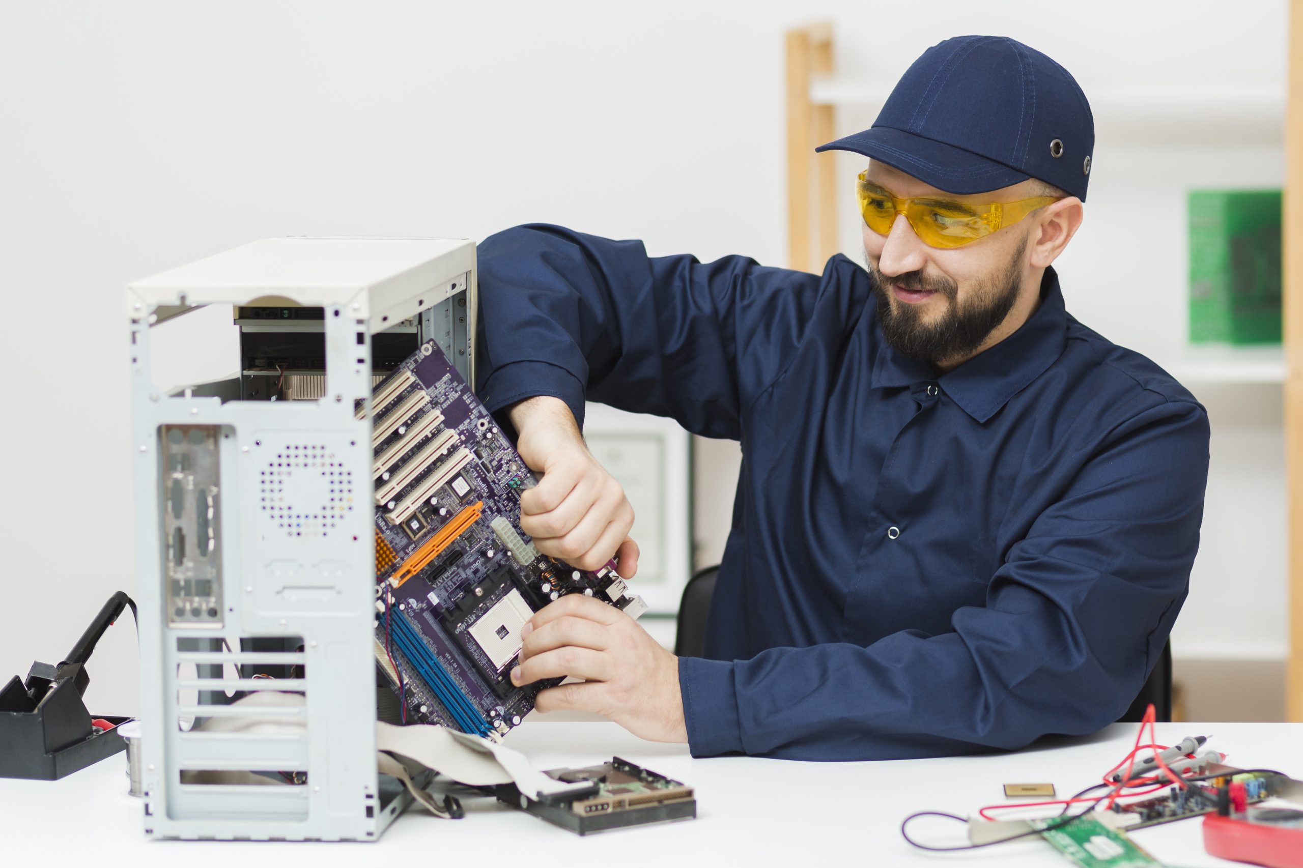 front-view-man-repairing-computer